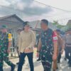 Bupati Poso, dr. Verna Gladies Merry Inkiriwang. Berjalan beriringan bersama Aster Kasdam XXIII/PW Kolonel Kav. Tody Wahyudi Sikumbang, Dandim 1307/Poso Letkol Arm. Edi Yulian Budiargo, unsur TNI-Polri, Kejaksaan, pemerintah daerah, serta tokoh masyarakat.